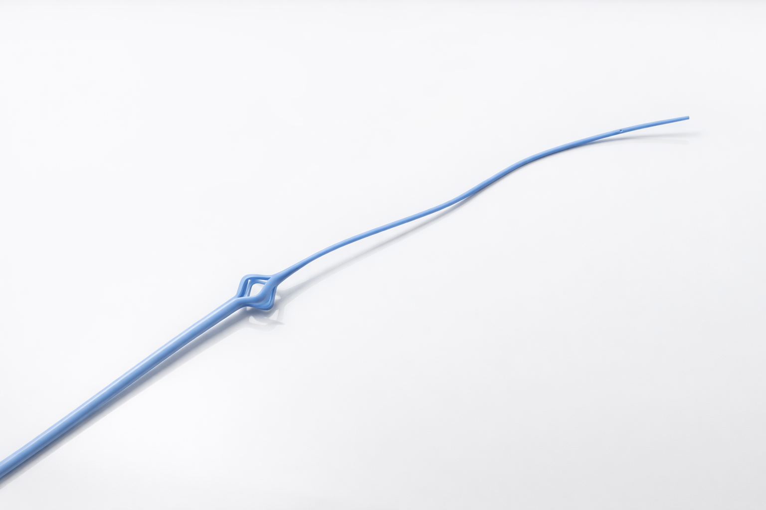 Re-entry Malecot Catheter